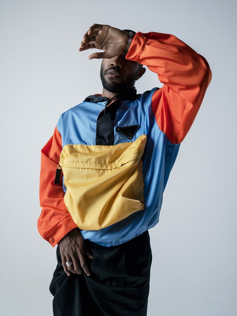 Singer Frank Ocean sports a Prada windbreaker jacket and shorts.