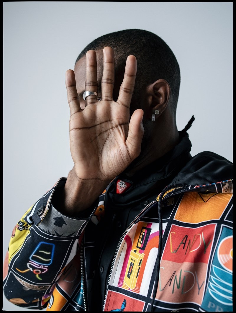 Connecting with W magazine, Frank Ocean wears a Prada shirt, jacket, neckerchief, and necklace.