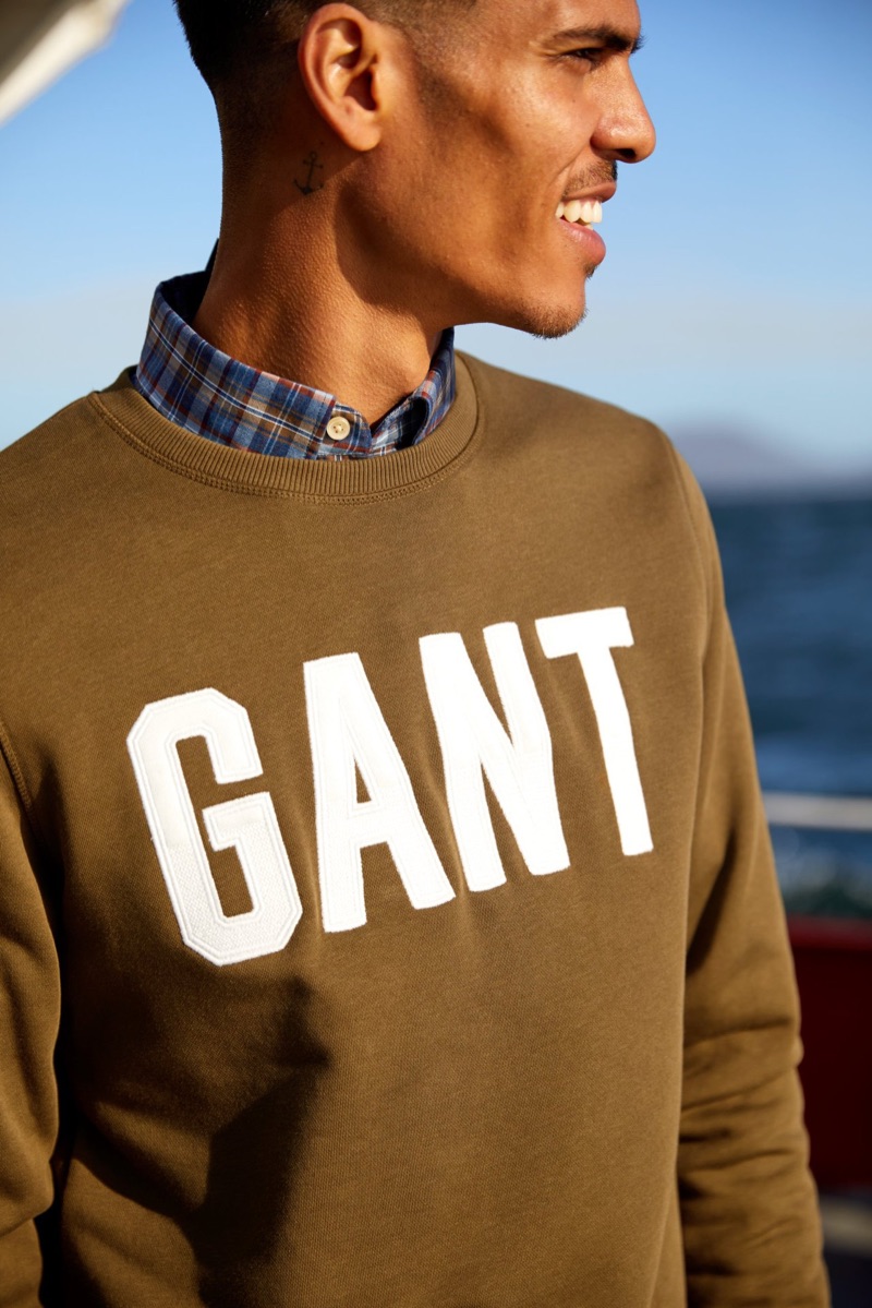 Sporting a Gant pullover, Geron McKinley fronts the brand's fall 2019 campaign.