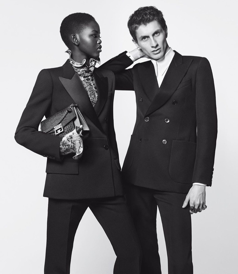 Adut Akech and Henry Kitcher don elegant tuxedos for Givenchy's 2019 "Winter of Eden" campaign.