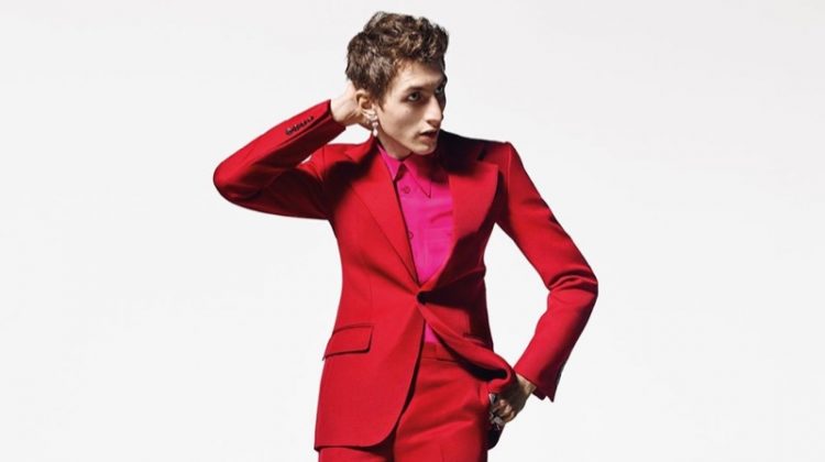 Model Henry Kitcher is striking in a red suit for Givenchy's 2019 'Winter of Eden' campaign.