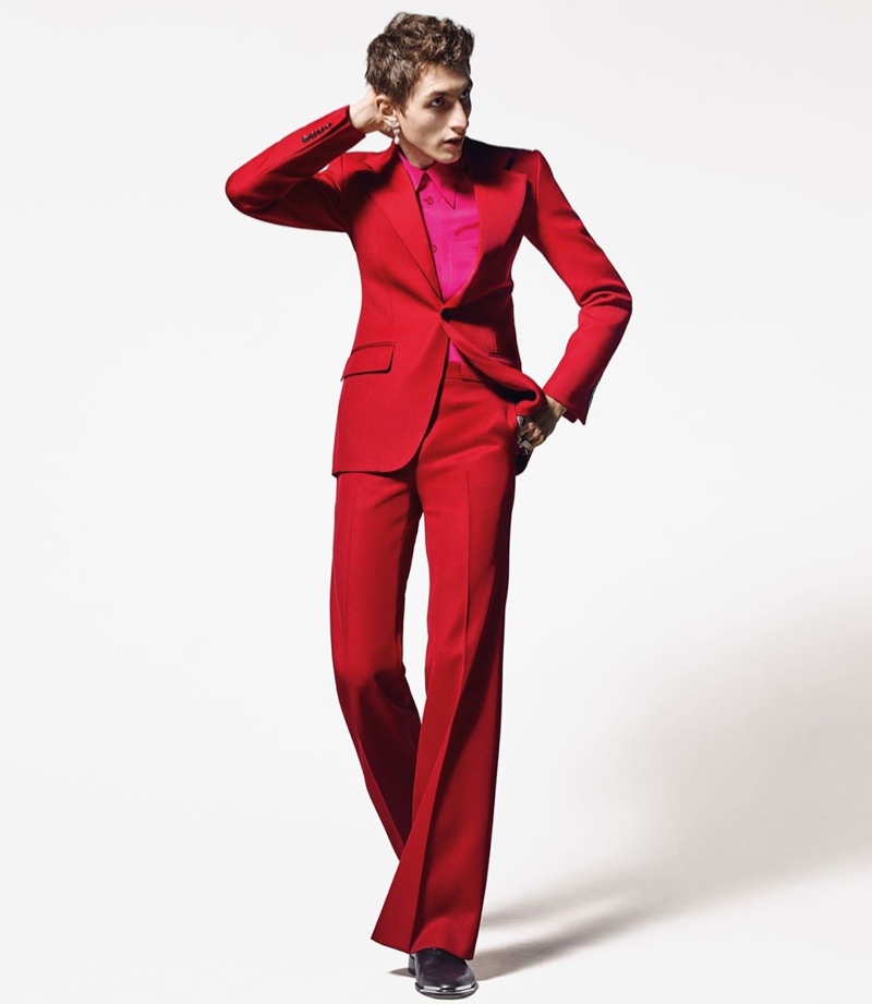 Model Henry Kitcher is striking in a red suit for Givenchy's 2019 'Winter of Eden' campaign.