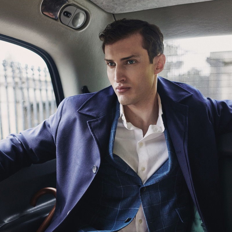 Charlie France dons a navy and blue look from Hackett London for the brand's fall-winter 2019 campaign.