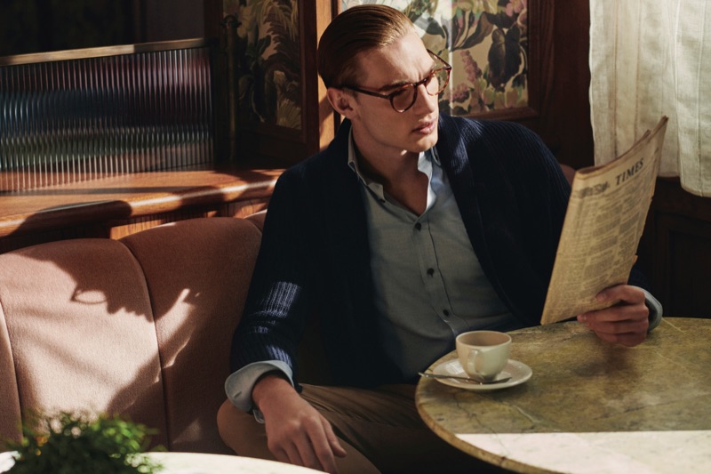Reading the newspaper, Tommy Marr fronts Hackett London's fall-winter 2019 campaign.