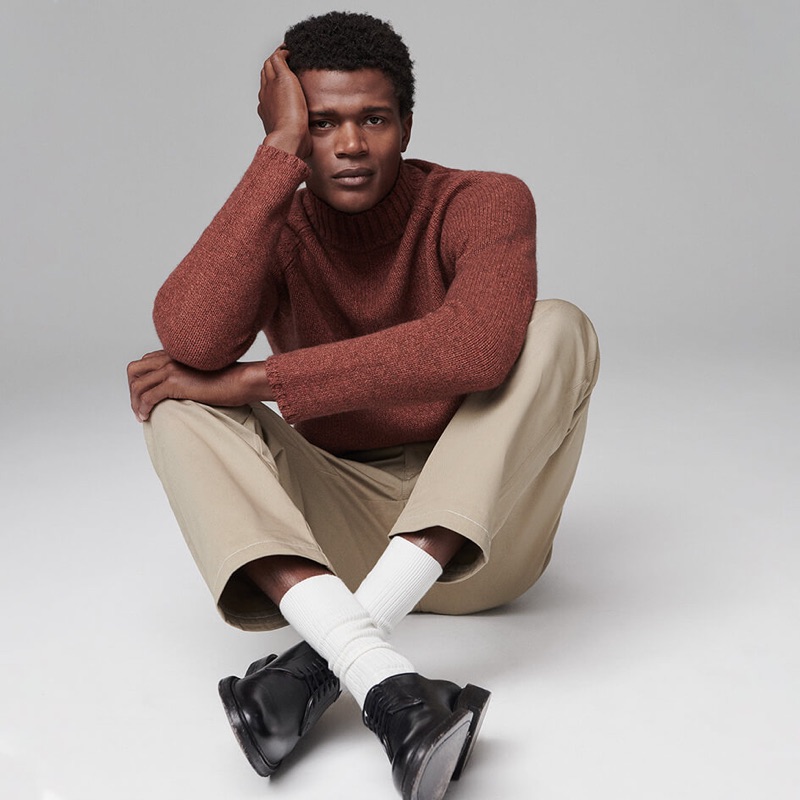 Front and center, O'Shea Robertson wears a look from Jigsaw's fall-winter 2019 men's collection.