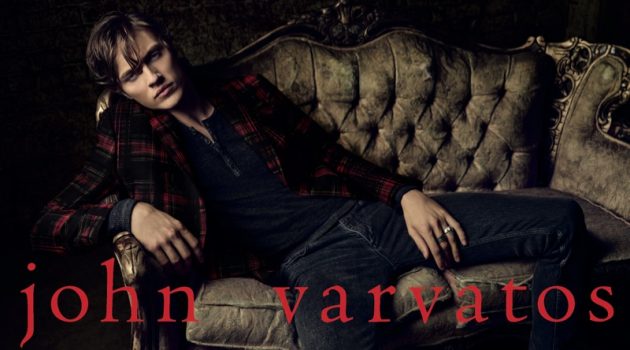 Lucky Blue Smith dons a tartan blazer with a henley and skinny jeans for John Varvatos' fall-winter 2019 campaign.