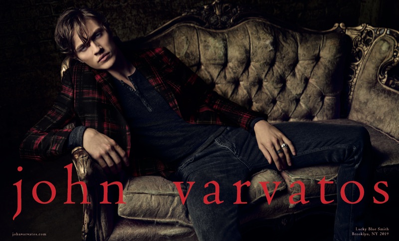 Lucky Blue Smith dons a tartan blazer with a henley and skinny jeans for John Varvatos' fall-winter 2019 campaign.