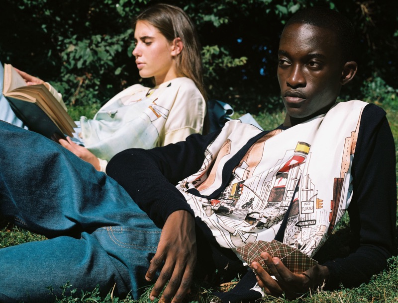 Cheikh Kebe relaxes in a graphic look from Lanvin's Babar collection.