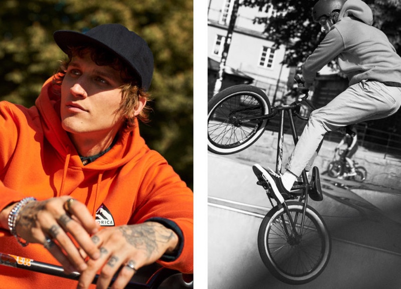 Riding his bike, Leebo Freeman rocks an orange hoodie from H&M.