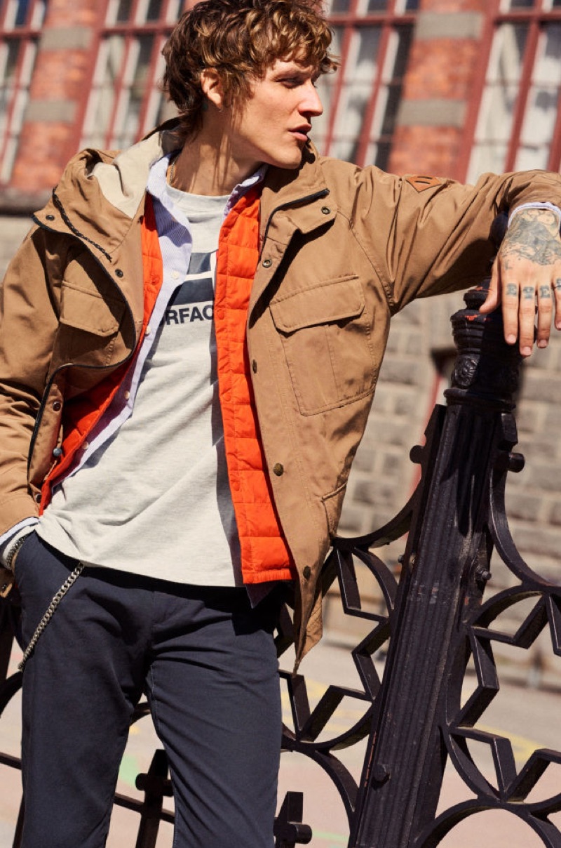 Layering for fall, Leebo Freeman wears a hooded jacket and more by H&M.