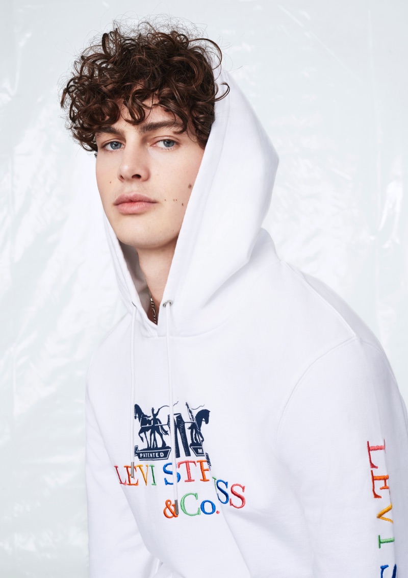 Darwin Gray sports a 90s logo hoodie from Levi's.