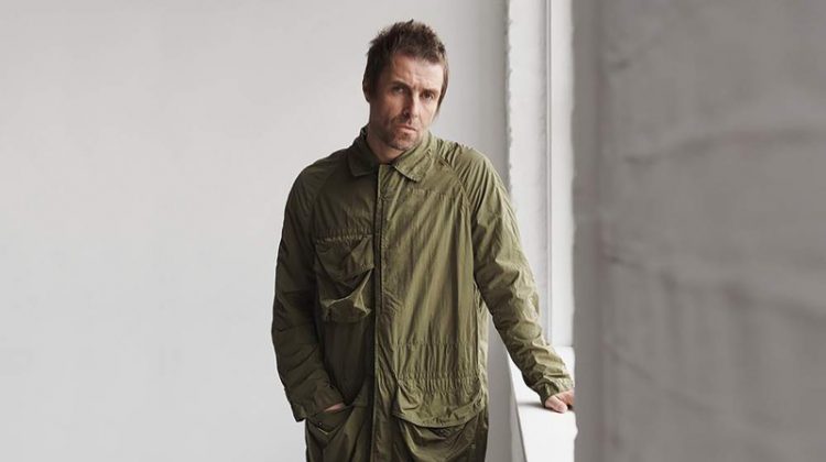 Front and center, Liam Gallagher wears a Burberry nylon coat.