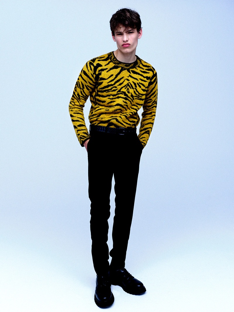 Making a bold statement, Louis Gockenjan rocks a zebra print Saint Laurent sweater $990.