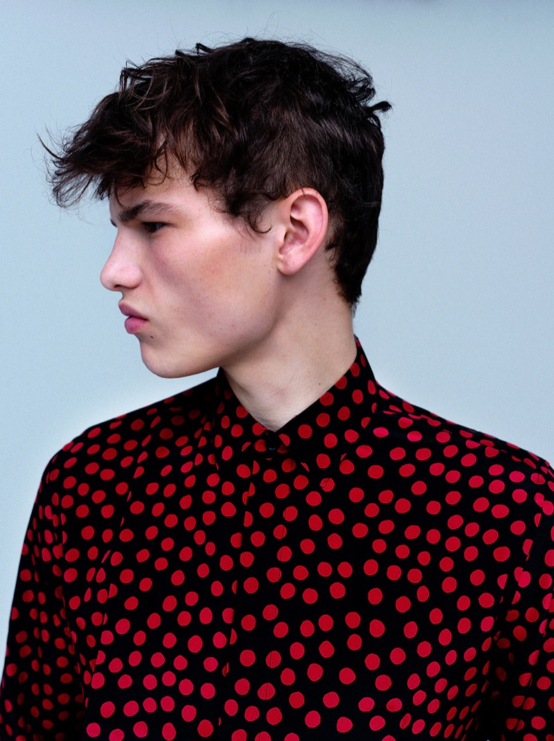 Donning Saint Laurent, Louis Gockenjan sports a red and black printed silk crêpe shirt $990.