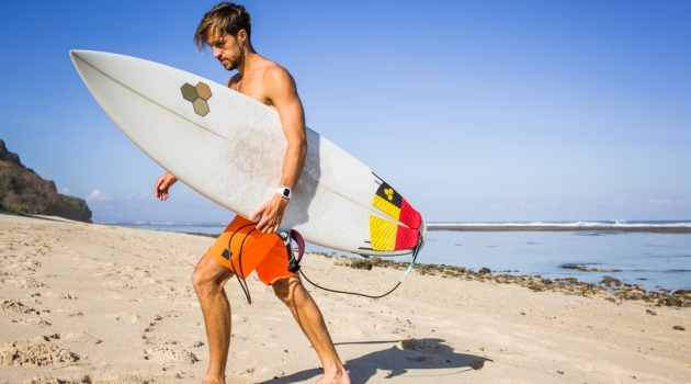 How to Select Swimwear for a Tropical Getaway Man Surfboard