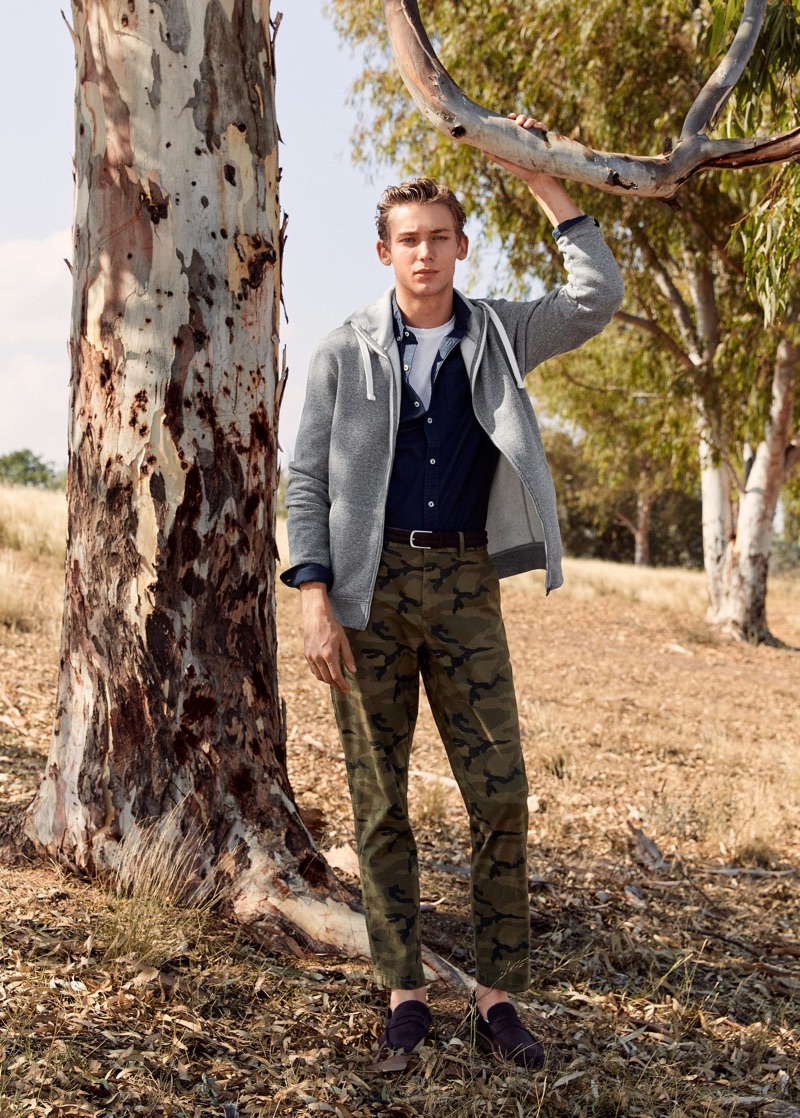 Making a case for camouflage, Christopher Einla wears Mango's statement pants with timeless essentials.