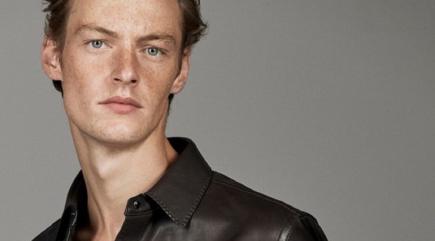 Making a luxurious statement, Roberto Sipos dons a leather shirt from Massimo Dutti's fall-winter 2019 runway collection.
