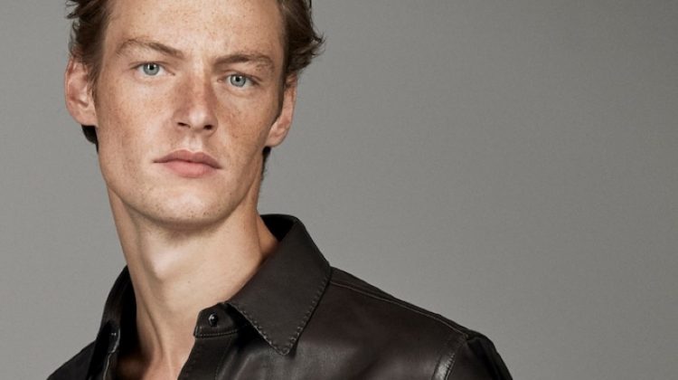Making a luxurious statement, Roberto Sipos dons a leather shirt from Massimo Dutti's fall-winter 2019 runway collection.