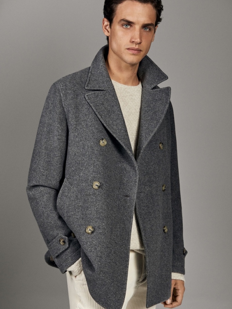 Donning a peacoat and corduroy pants, Federico Novello wears fashions from Massimo Dutti's fall-winter 2019 runway collection.