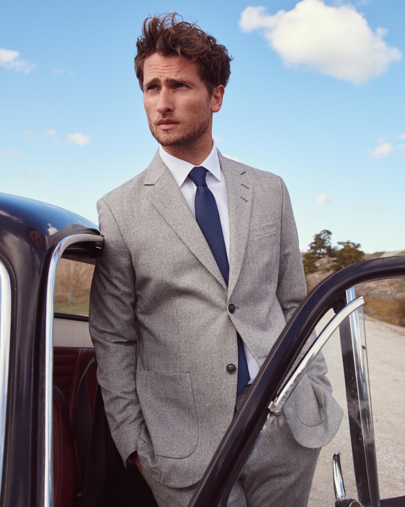 British model Tom Warren dons a sharp suit for Peek & Cloppenburg's fall-winter 2019 campaign.