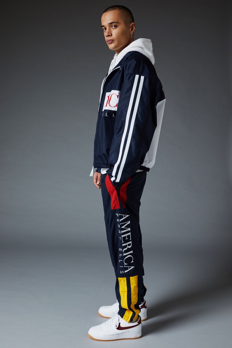 A sporty vision in navy, Lancelot Prat dons a look from the Perry Ellis America Capsule 3 collection. » Perry Ellis America Capsule 3 Launches at Urban Outfitters A sporty vision in navy, Lancelot Prat dons a look from the Perry Ellis America Capsule 3 collection.