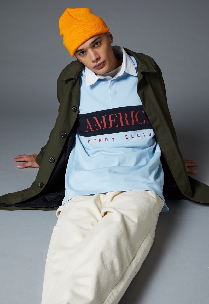 Taking to the studio, Lancelot Prat sports a Perry Ellis logo rugby shirt. » Perry Ellis America Capsule 3 Launches at Urban Outfitters Taking to the studio, Lancelot Prat sports a Perry Ellis logo rugby shirt.