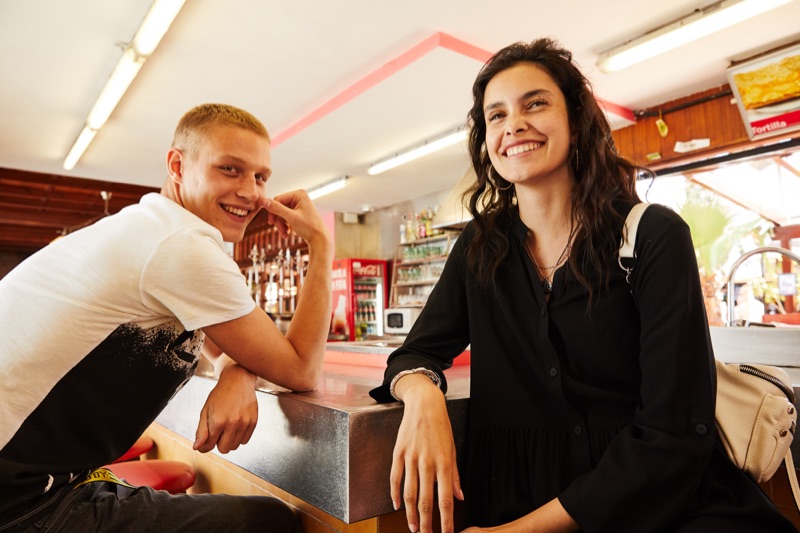 All smiles, Michael Oder and Zoe Barnard front Q/S by s.Oliver's fall-winter 2019 campaign.