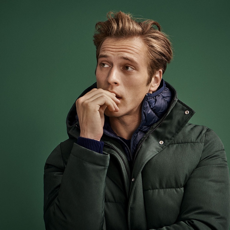 Model Jules Raynal dons a puffer jacket from Selected Homme.