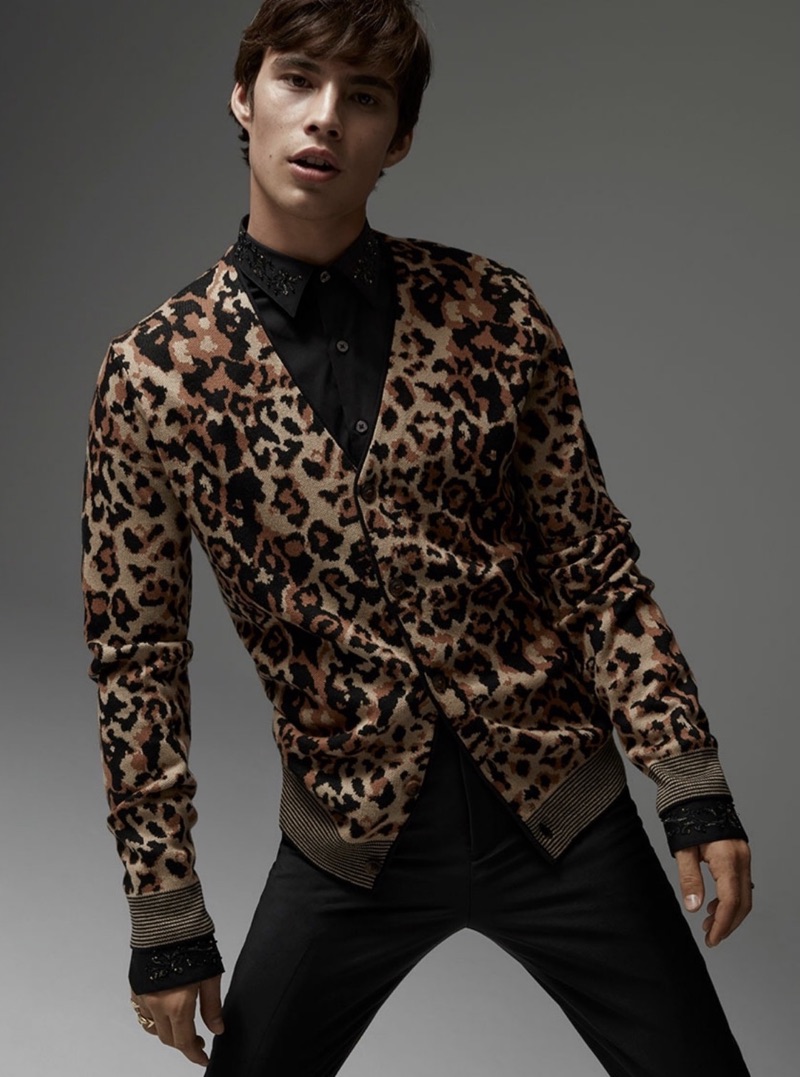 Making a case for animal prints, Louis Baines wears a LE 31 leopard print cardigan with an adorned shirt, and tuxedo pants.