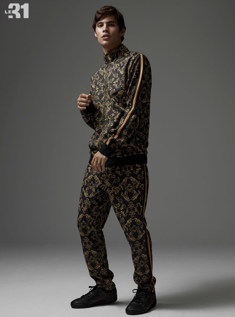 Going sporty, Louis Baines dons a LE 31 neo baroque tracksuit.
