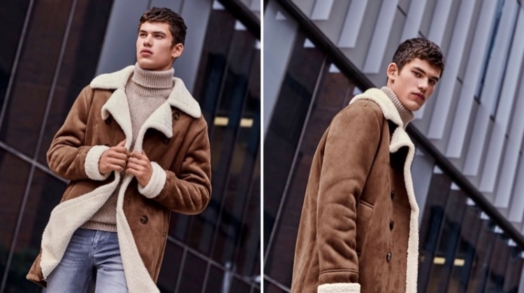 Embracing fall style, Finn Hayton models a brown shearling coat with a turtleneck sweater and distressed jeans from Simons.