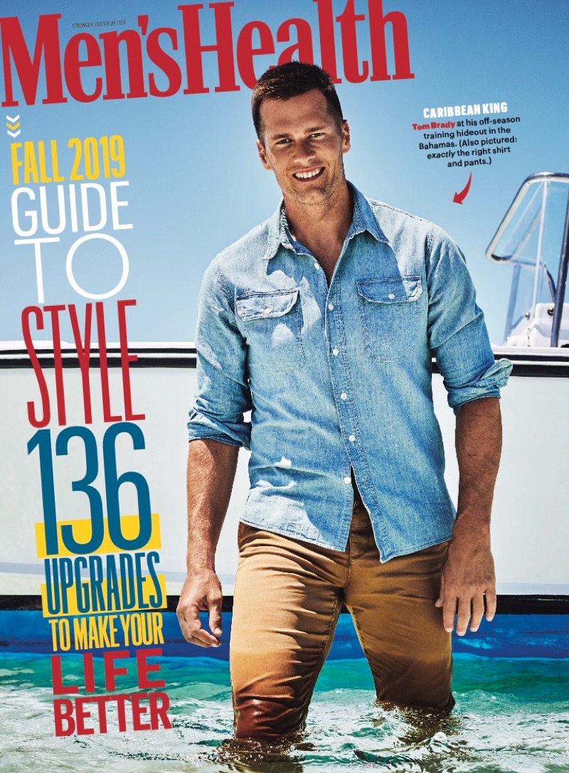 Sporting a denim shirt and khaki pants, Tom Brady covers the September 2019 issue of Men's Health.