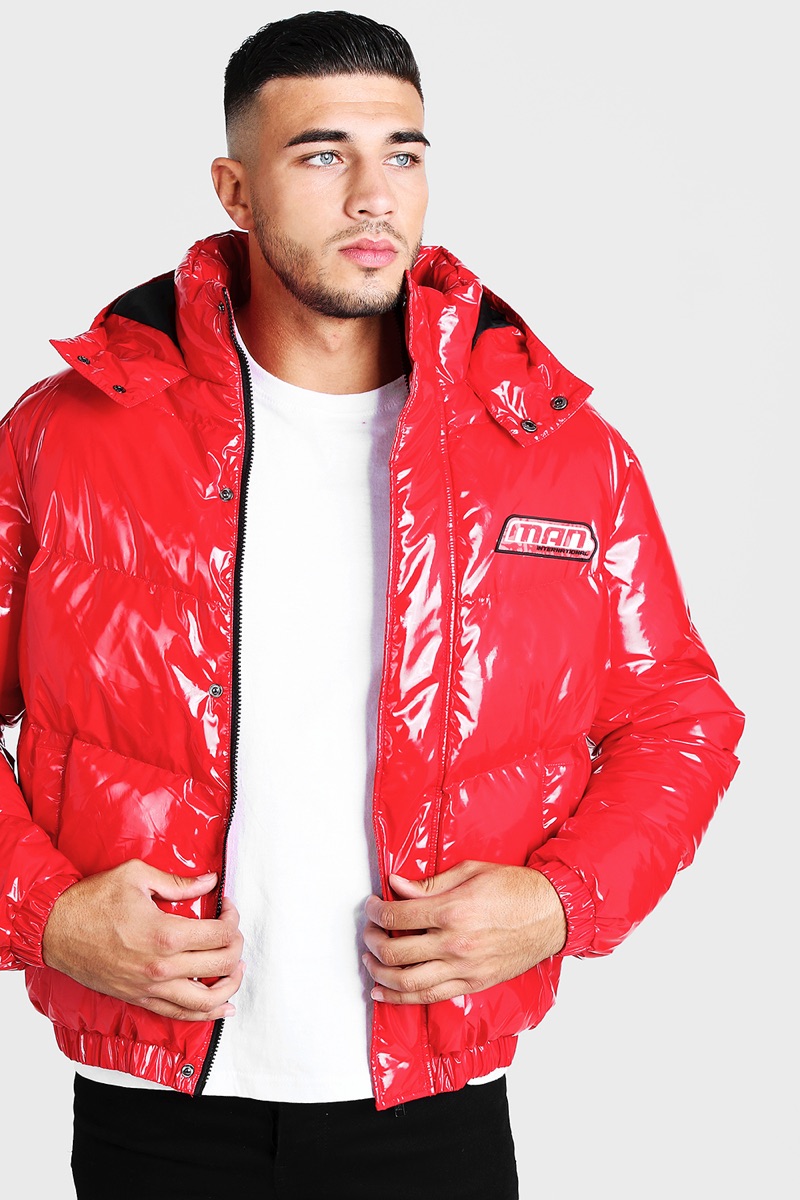 Love Island finalist Tommy Fury dons a red puffer jacket by BOOHOOMAN.
