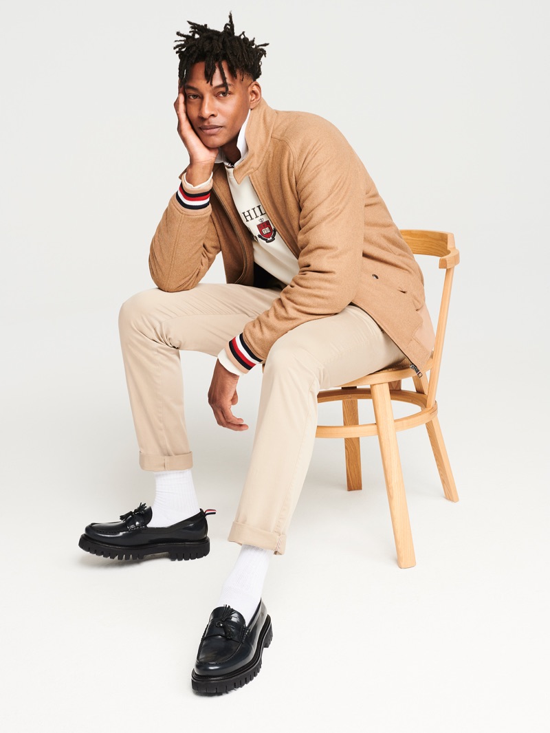 Ty Ogunkoya dons a neutral-colored look from Tommy Hilfiger's fall-winter 2019 men's collection.
