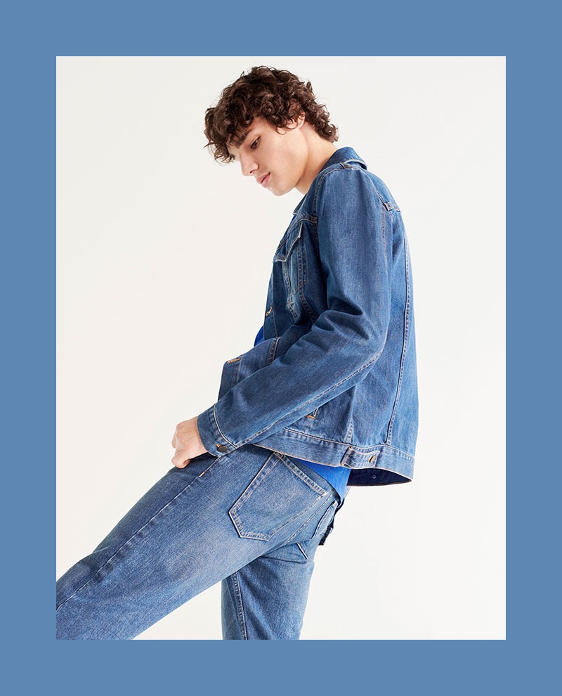 Fernando Lindez doubles down on denim, sporting a jean jacket with jeans from YOOX.