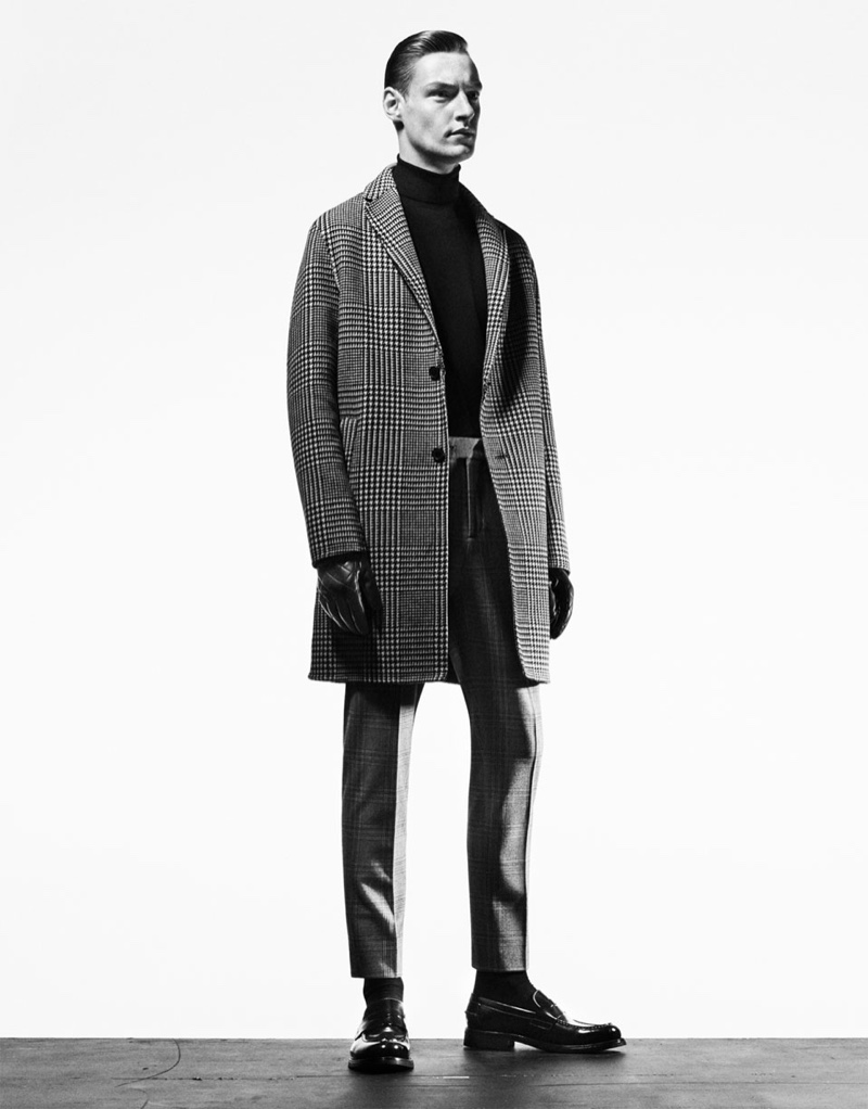 Front and center, Roberto Sipos sports a tailored look from Zara for fall.