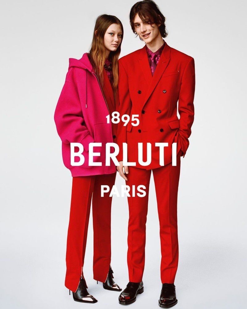 Standing out in red suits, models Sara Grace Wallerstedt and Wellington Grant appear in Berluti's fall-winter 2019 campaign.