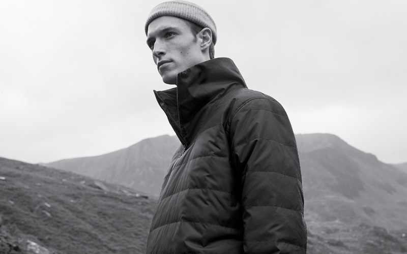 Model Egon Van Praet sports a puffer jacket from COS' fall 2019 men's collection.