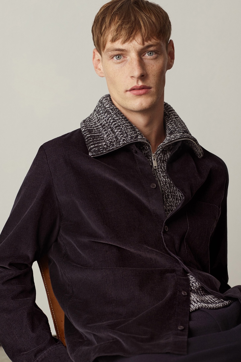 Roberto Sipos sports a corduroy shirt with a high-neck mock collar from COS.