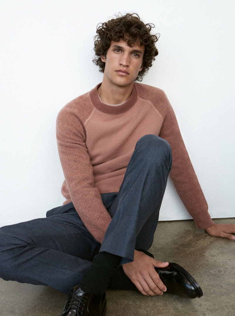 Front and center, Francisco Henriques wears a mauve garment-dyed sweater $149.50 from Club Monaco.