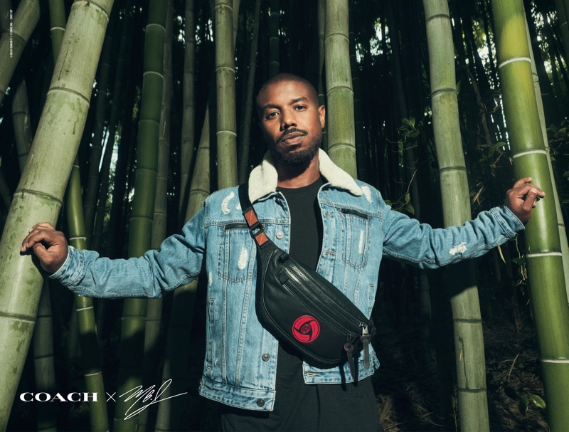 Actor Michael B. Jordan wears a leather belt bag and denim jacket from his Coach capsule collection.