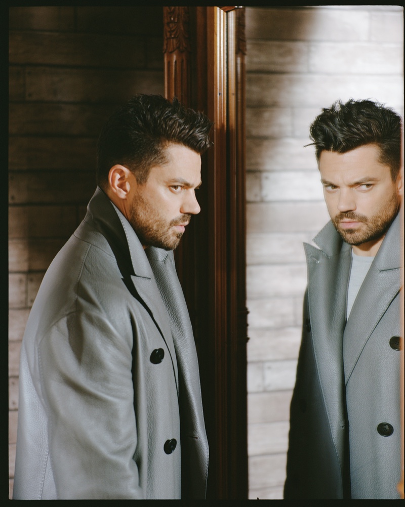 Connecting with The Laterals, Dominic Cooper dons a leather coat by Berluti with a Sunspel sweater.