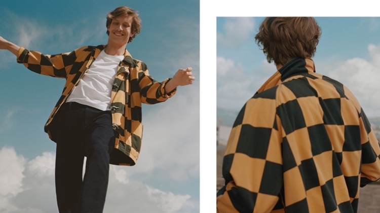 Sporting a checker print jacket, Felix Gesnouin stars in Esprit's fall 2019 campaign.