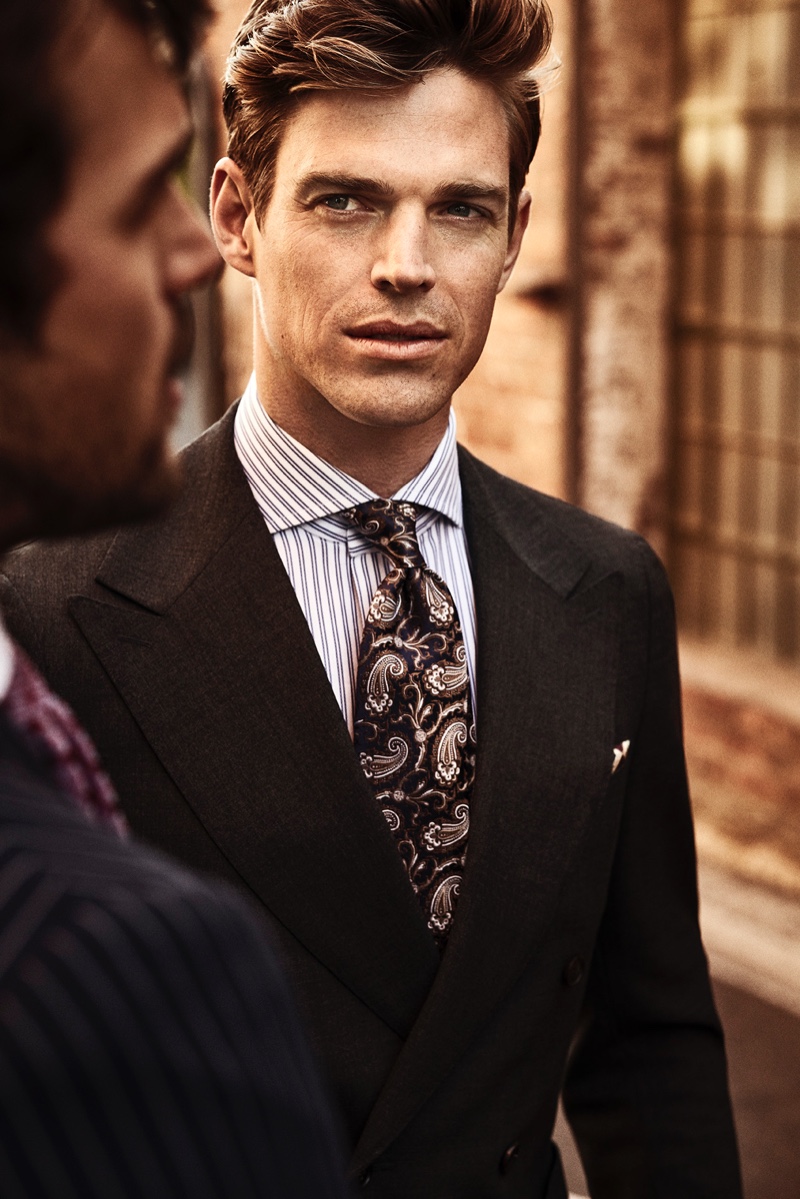 Zack Hartwanger dons a striped shirt with a paisley print tie by Eton.