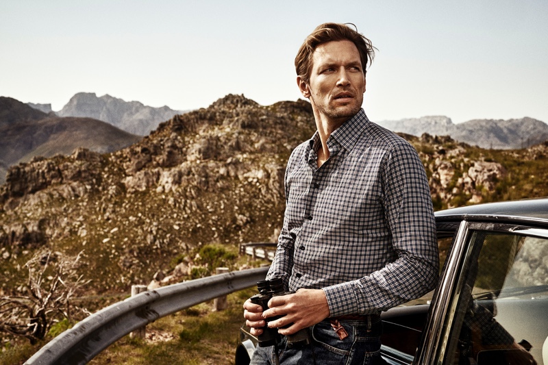 Venturing outdoors, Robertas Aukstuolis wears a shirt by Eton.