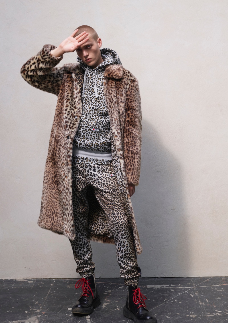 Making a case for animal prints, Tom Rey models a must-have look from the Giambattista Valli x H&M collection.