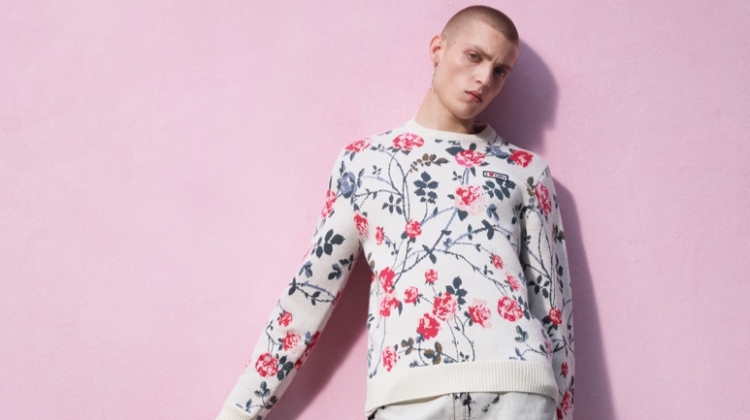 Tom Rey sports a floral print and bleach look from the Giambattista Valli x H&M collection.