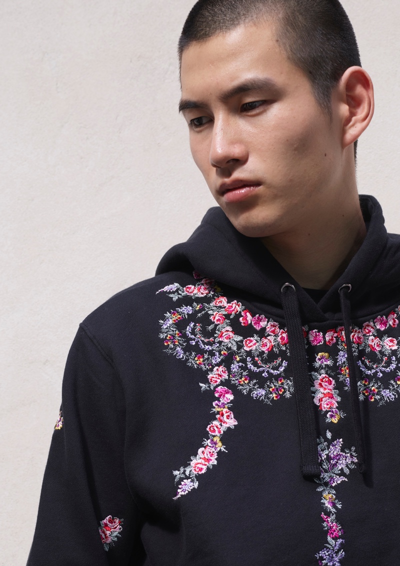 Kohei Takabatake and Oslo Grace embrace streetwear-influenced looks from the Giambattista Valli x H&M collection.