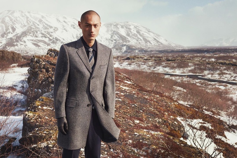 Donning a sleek gray coat,  Wei Qi fronts Gieves & Hawkes' fall-winter 2019 campaign.