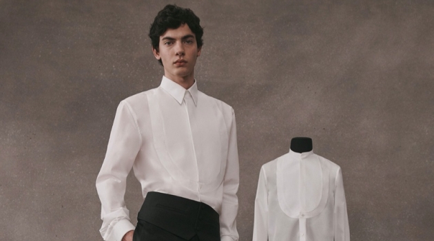 Givenchy Atelier Revisits Designer Staples Lev Uliesov dons a sleek white and black tailored look from the Givenchy Atelier collection.